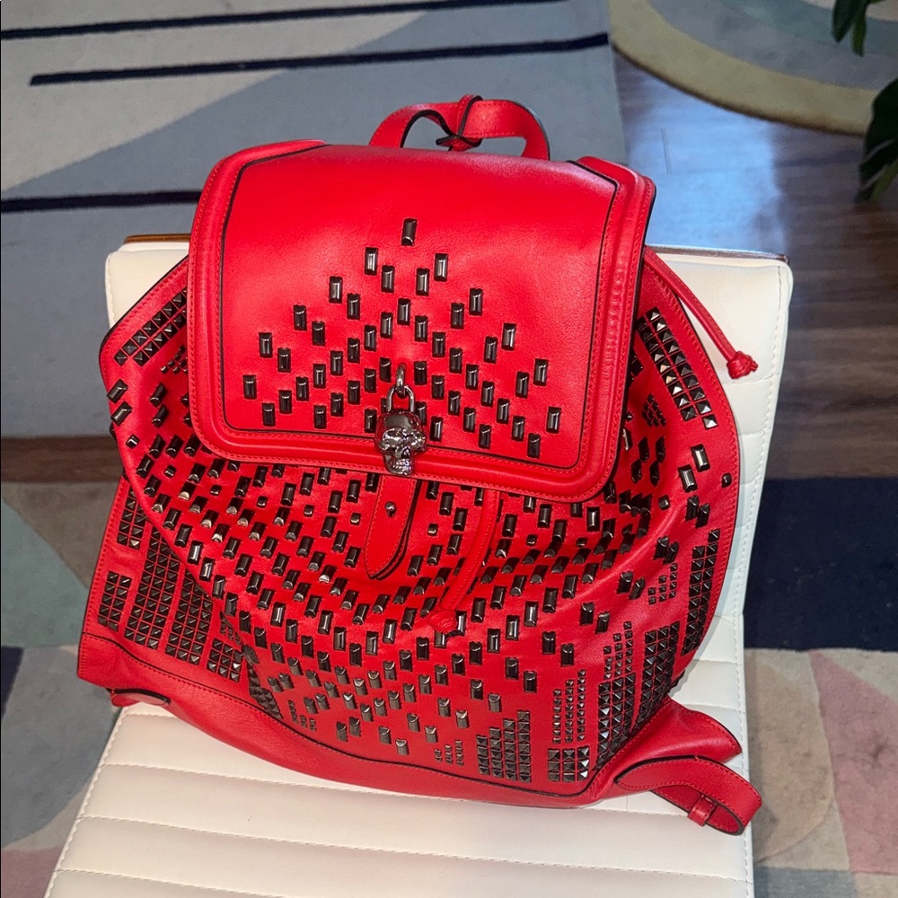 Authentic Alexander McQueen Red Studded Leather Backpack.